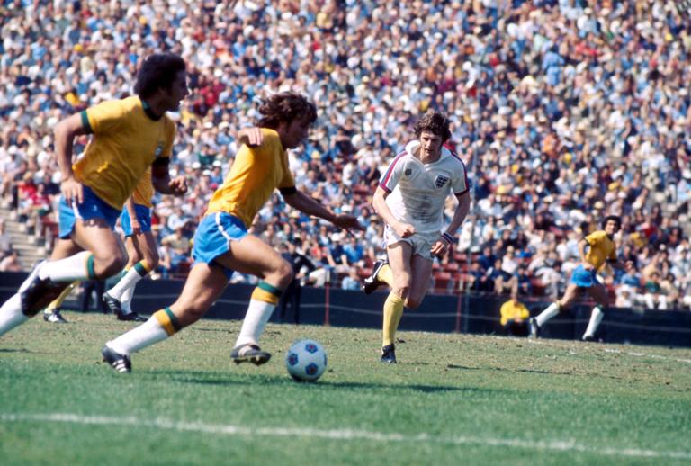 England's Mick Channon (r) sprints across to try to thwart a Brazil attack  (Photo by Peter Robinson/EMPICS via Getty Images)