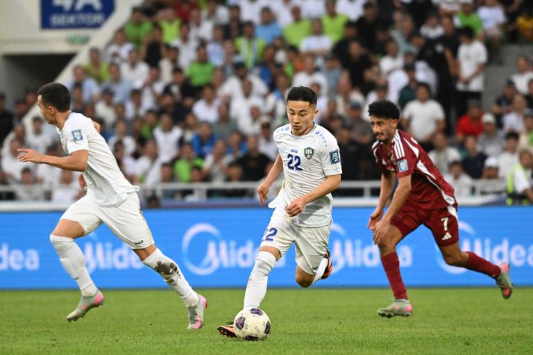 Uzbekistan's Abbosbek Fayzullaev on the ball in a World Cup qualifier against Qatar